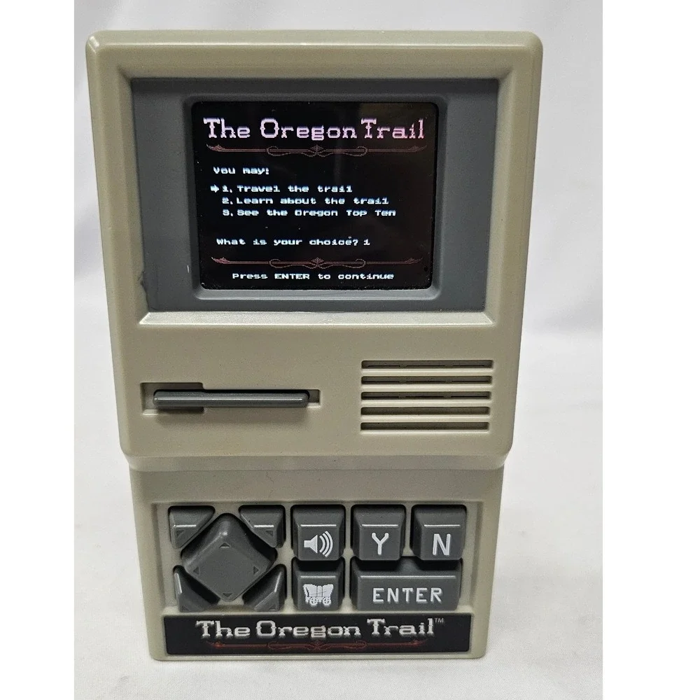 Basic Fun The Oregon Trail Handheld Electronic Game Retro 09597 Tan Color Screen
